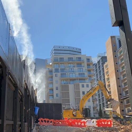 Perimeter dust suppression N Sydney Moment